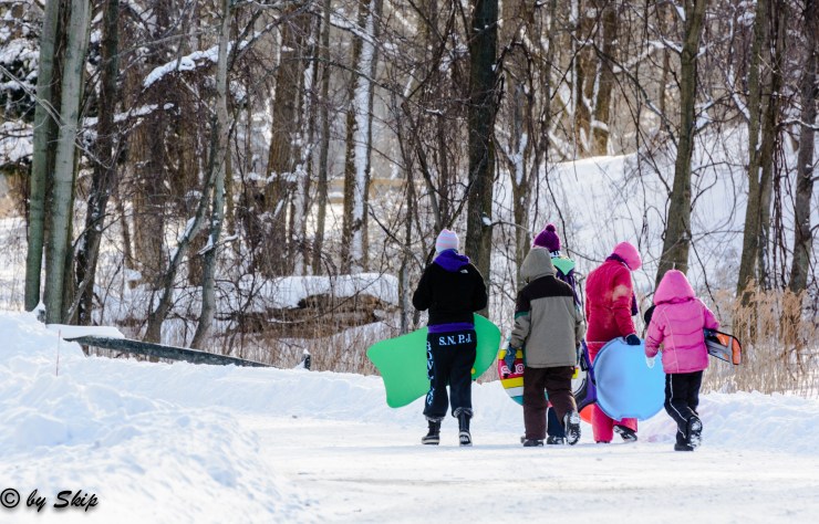 All bundled up and heading for the hill